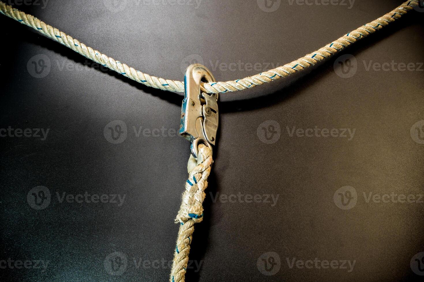 Hook and rope of Safety Equipment hang on rope photo