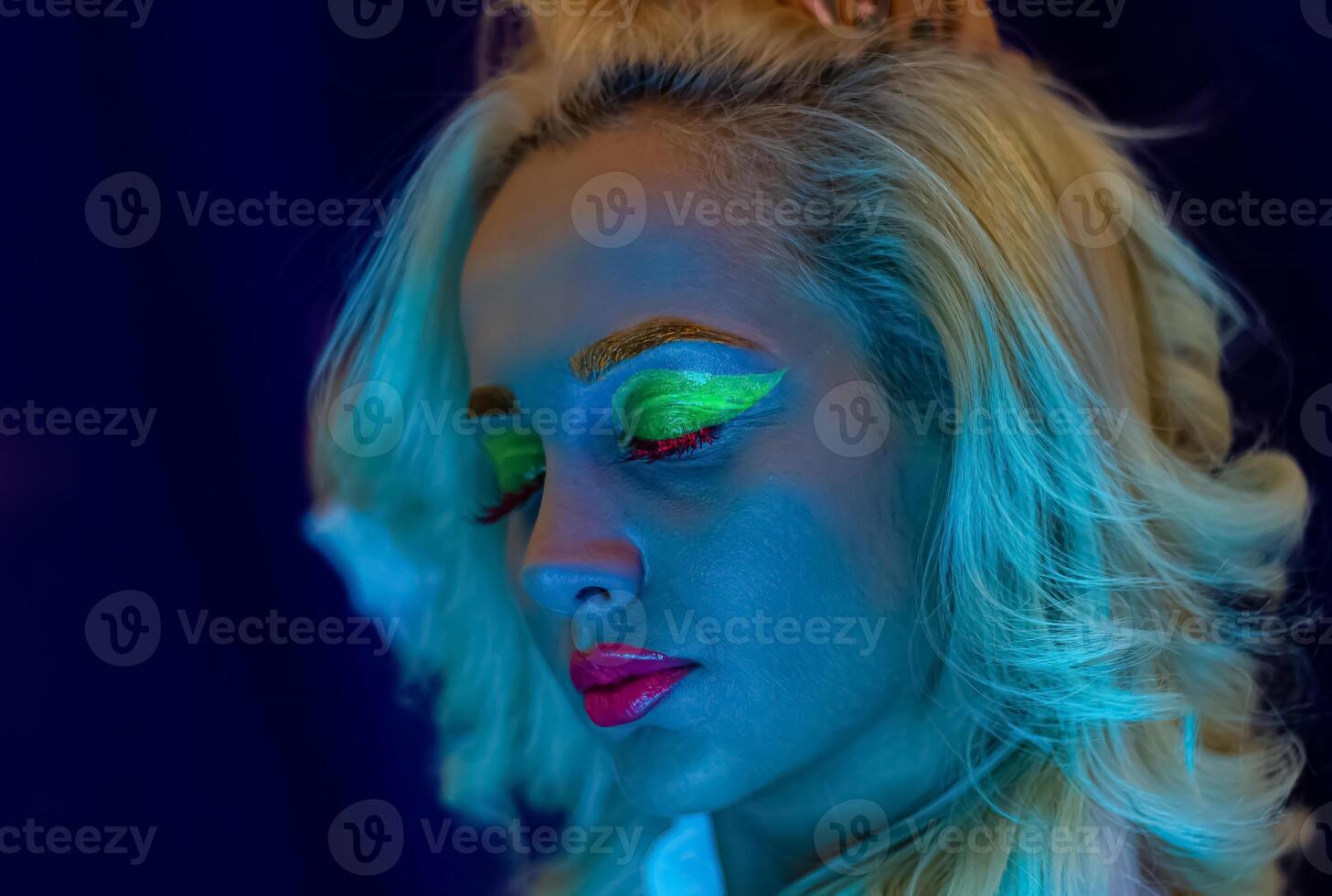 portrait of a woman with painted face, woman with uv makeup in studio, portrait of a woman in carnival mask, the woman is decorated in a ultraviolet powder photo