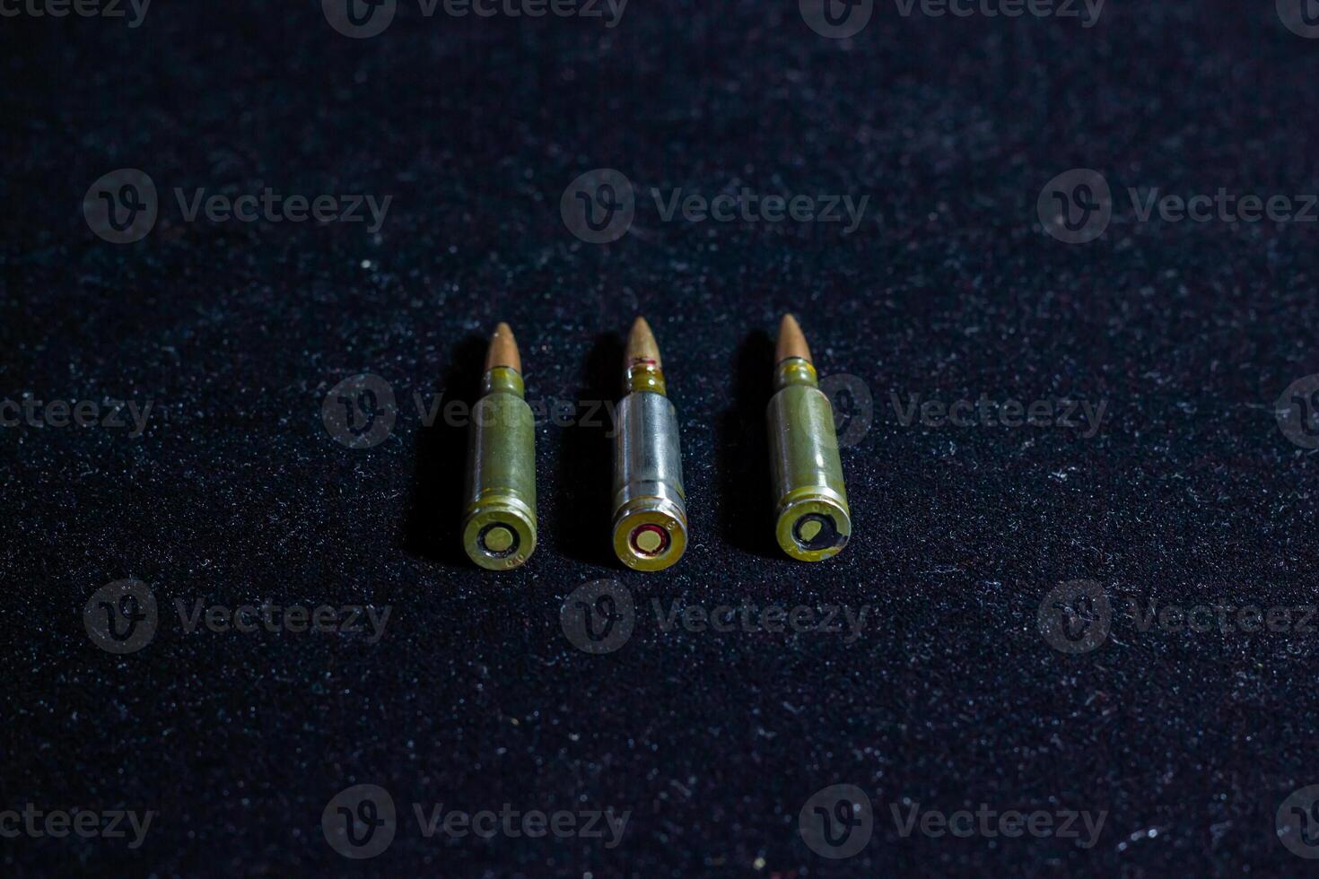 bullets in the dark, a lot of bullets on black, bullets on black background photo