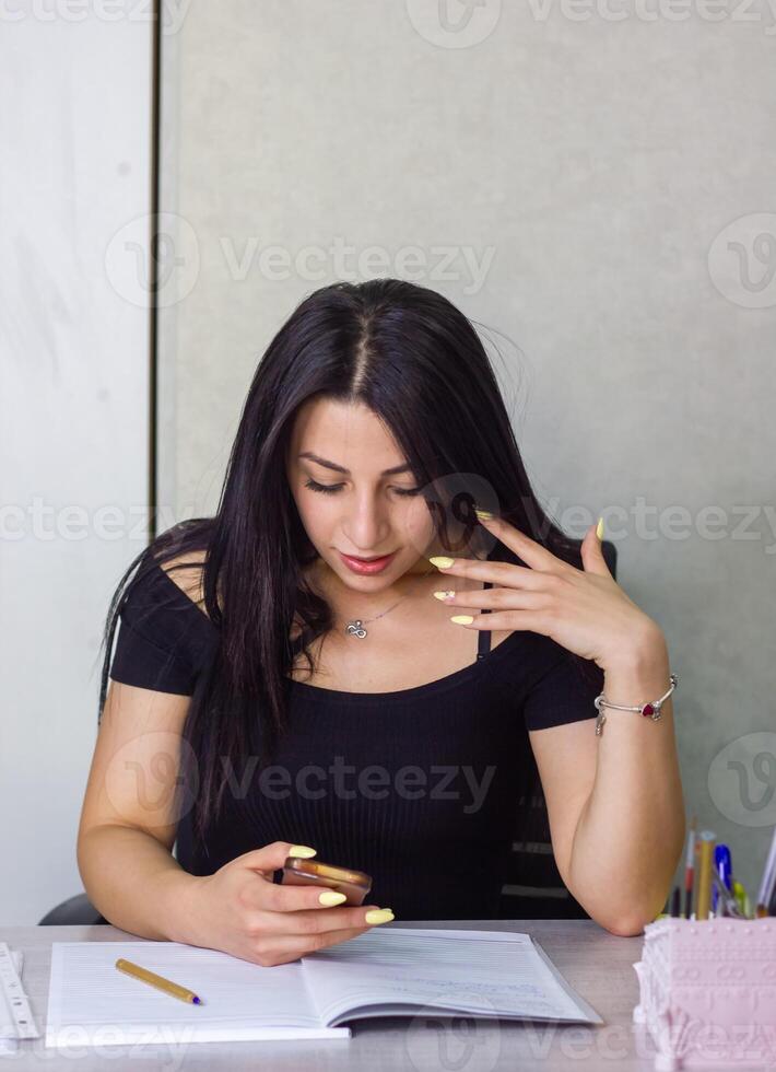 pretty young woman working in office, office girl at the work photo
