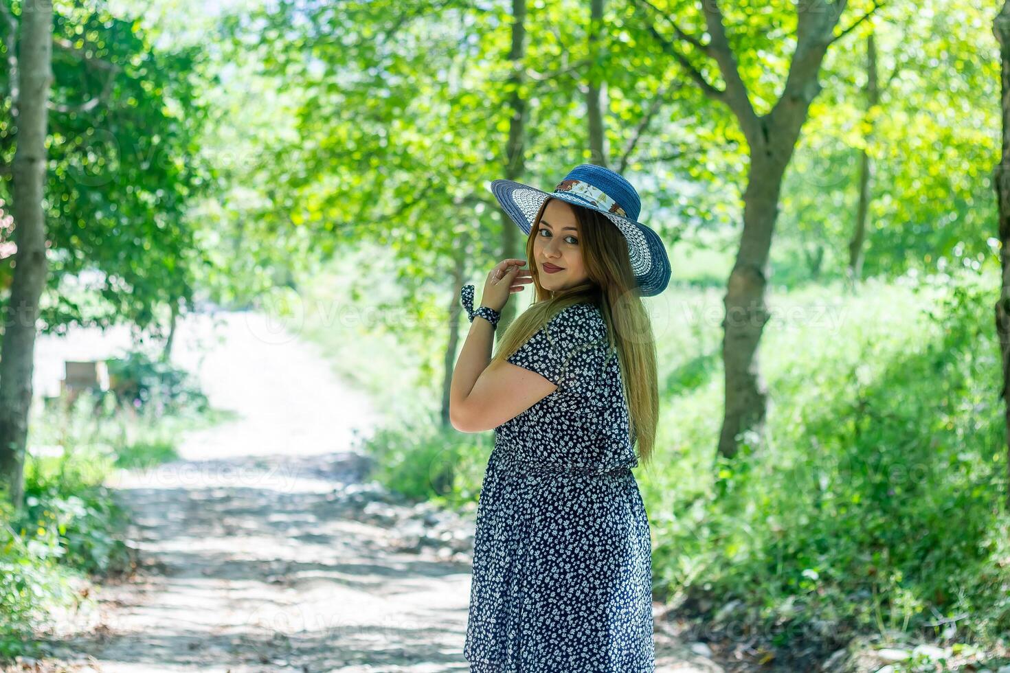 pretty young girl in the nature photo