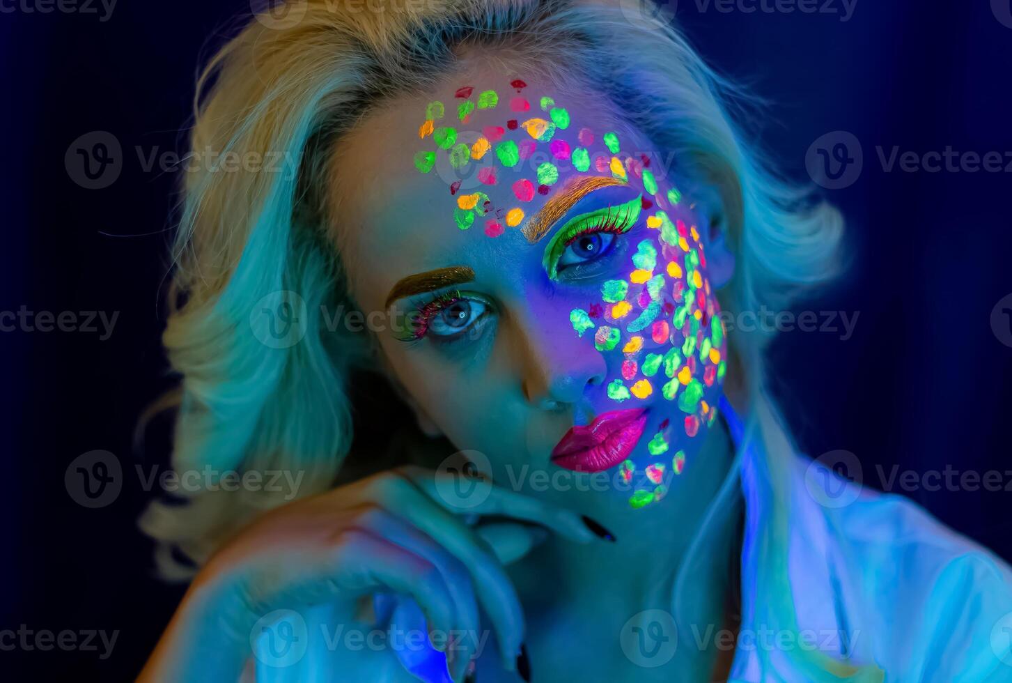 portrait of a woman with painted face, woman with uv makeup in studio, portrait of a woman in carnival mask, the woman is decorated in a ultraviolet powder photo