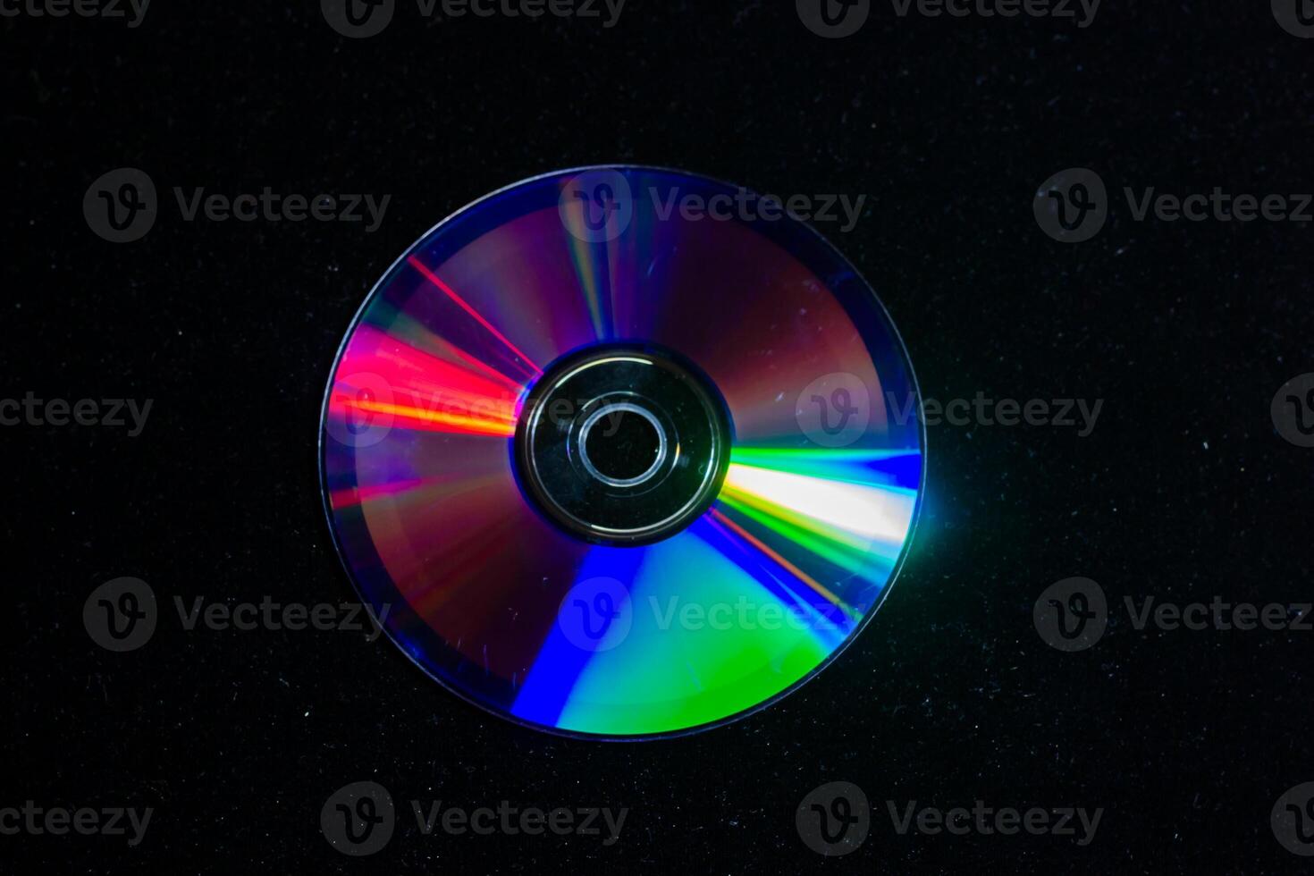 cd dvd isolated on black, cd dvd background, disk in the dark photo