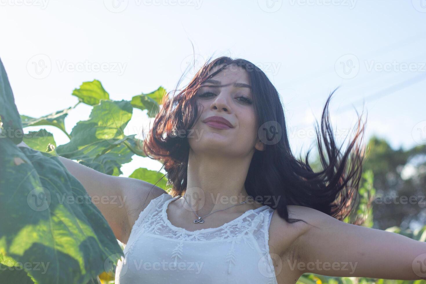 pretty young woman in the nature, summer scenery photo