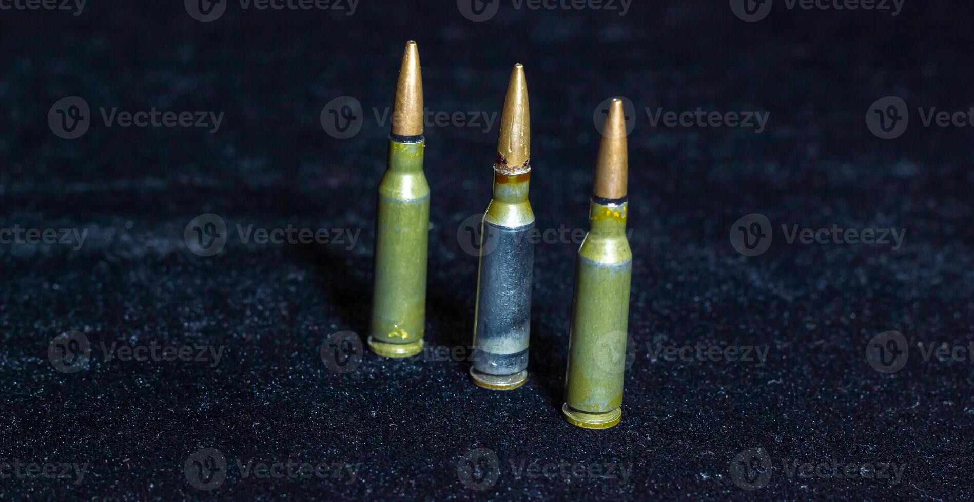 bullets in the dark, a lot of bullets on black, bullets on black background photo