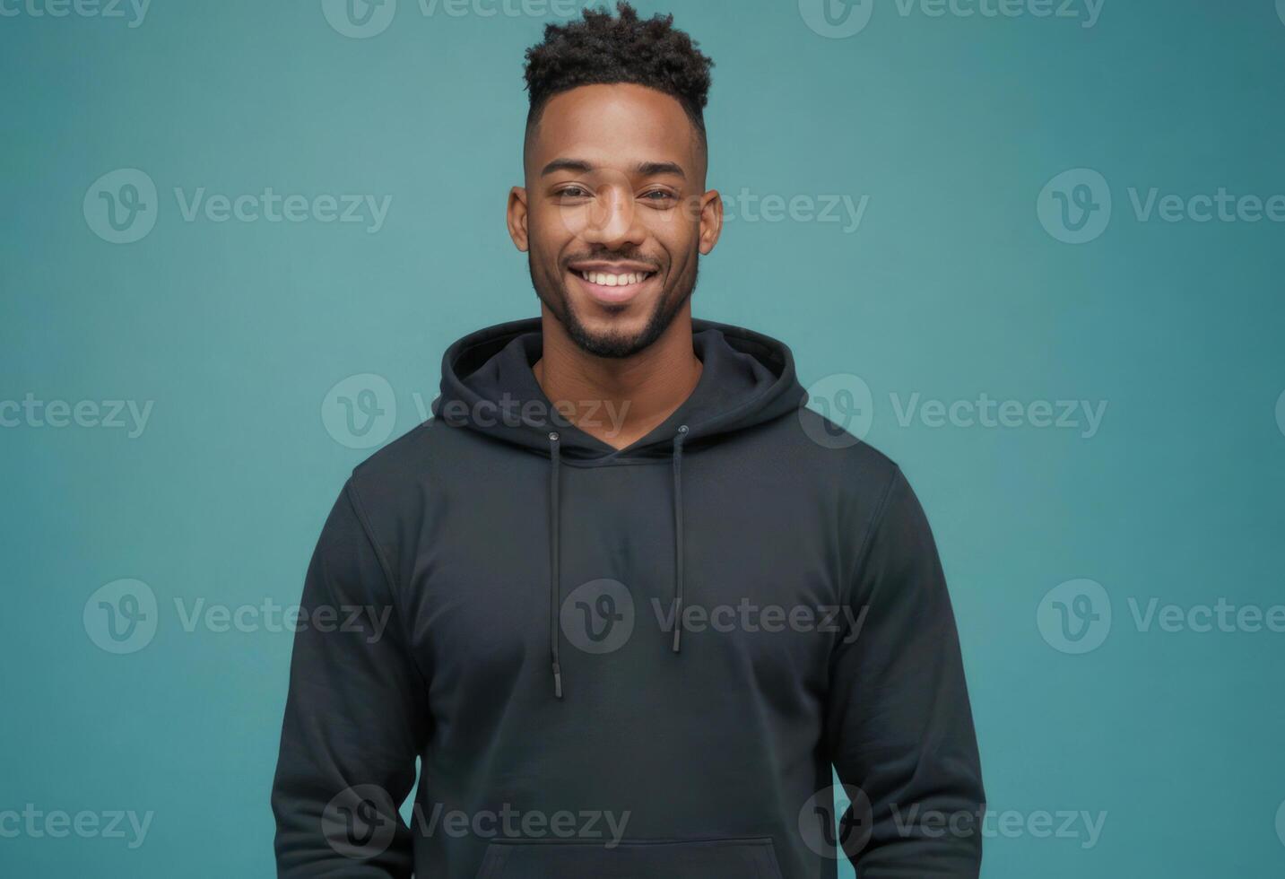 AI Generated Cheerful man in a dark hoodie, his easy smile and casual posture promoting a relaxed, comfortable vibe. photo