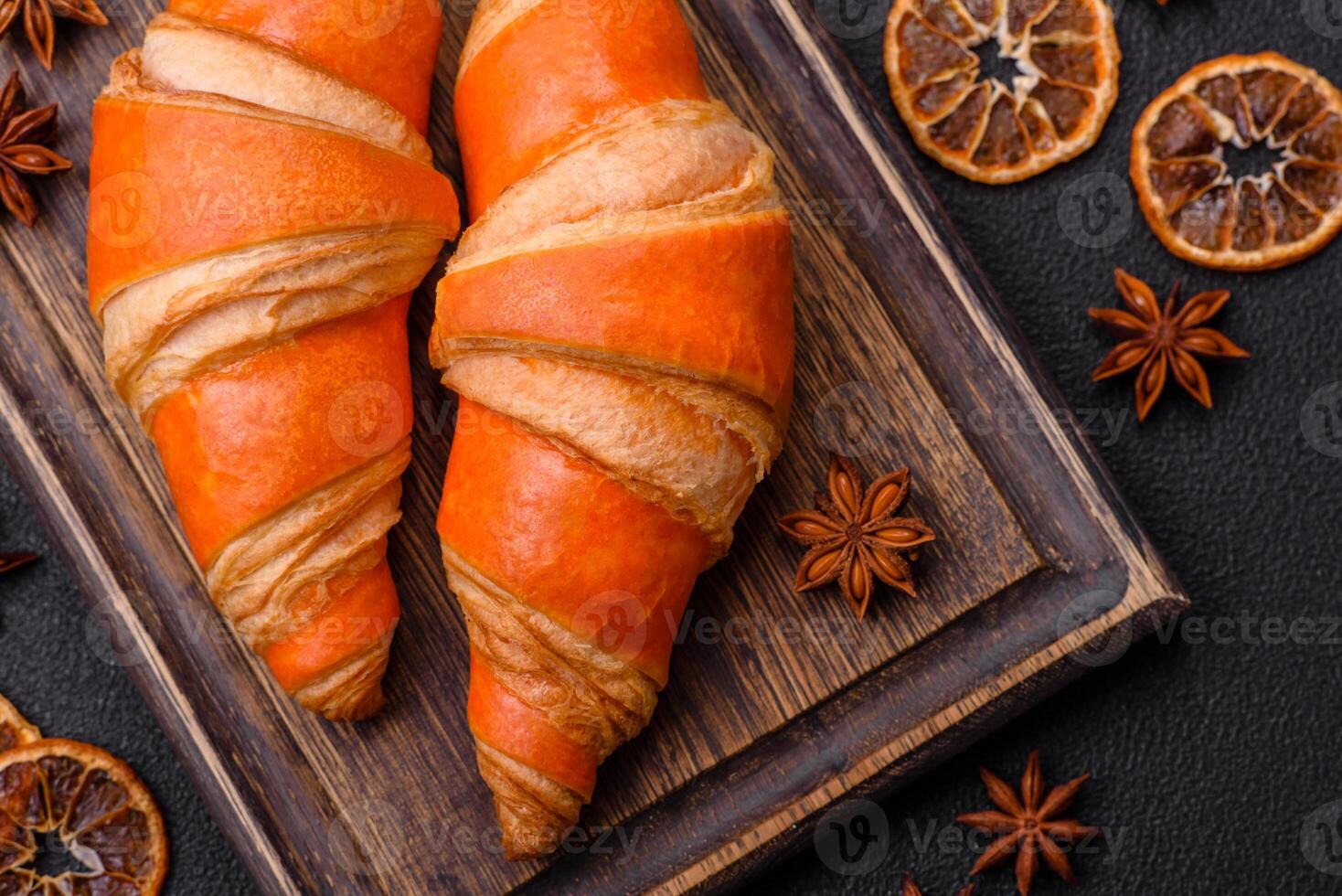 Delicious fresh, crispy French croissants with sweet filling photo