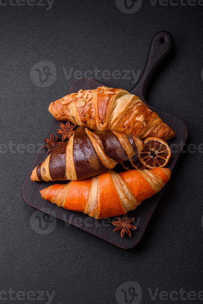 Delicious fresh, crispy French croissants with sweet filling photo