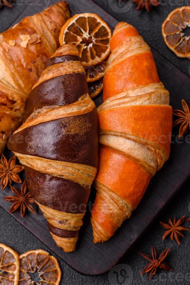 Delicious fresh, crispy French croissants with sweet filling photo