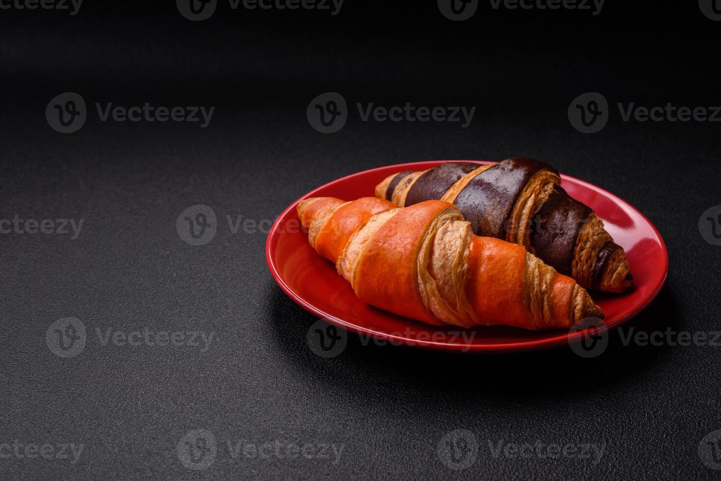 Delicious fresh, crispy French croissants with sweet filling photo