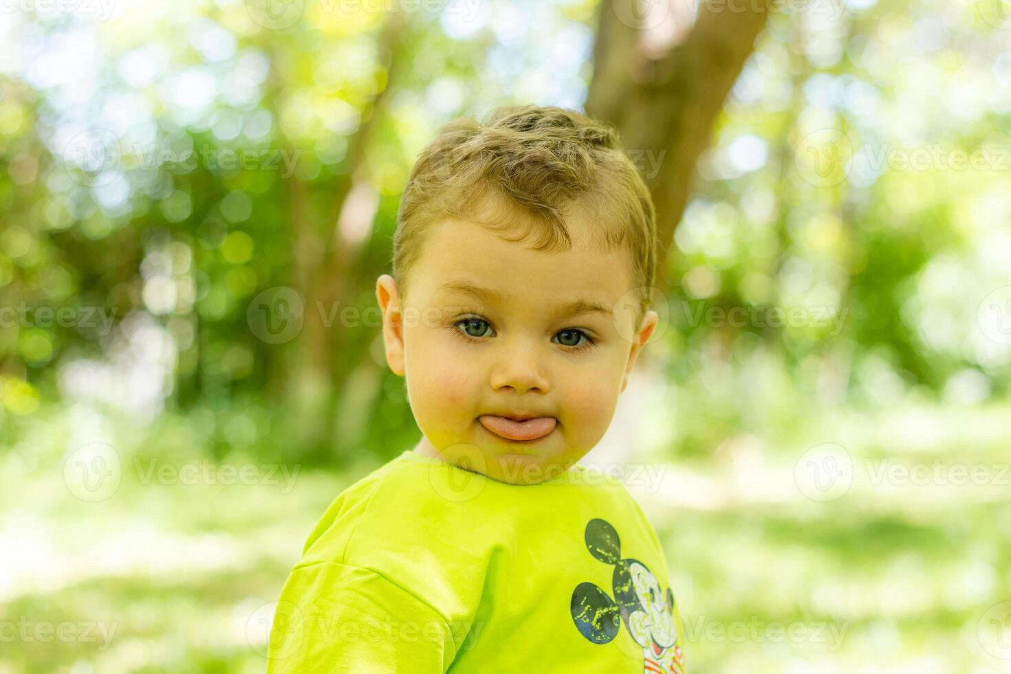 child playing in the garden, child playing on the playground photo