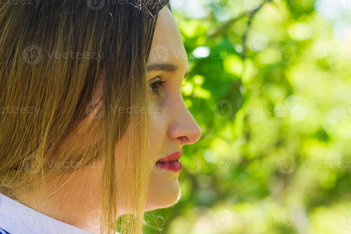 pretty young woman in the nature, summer scenery photo