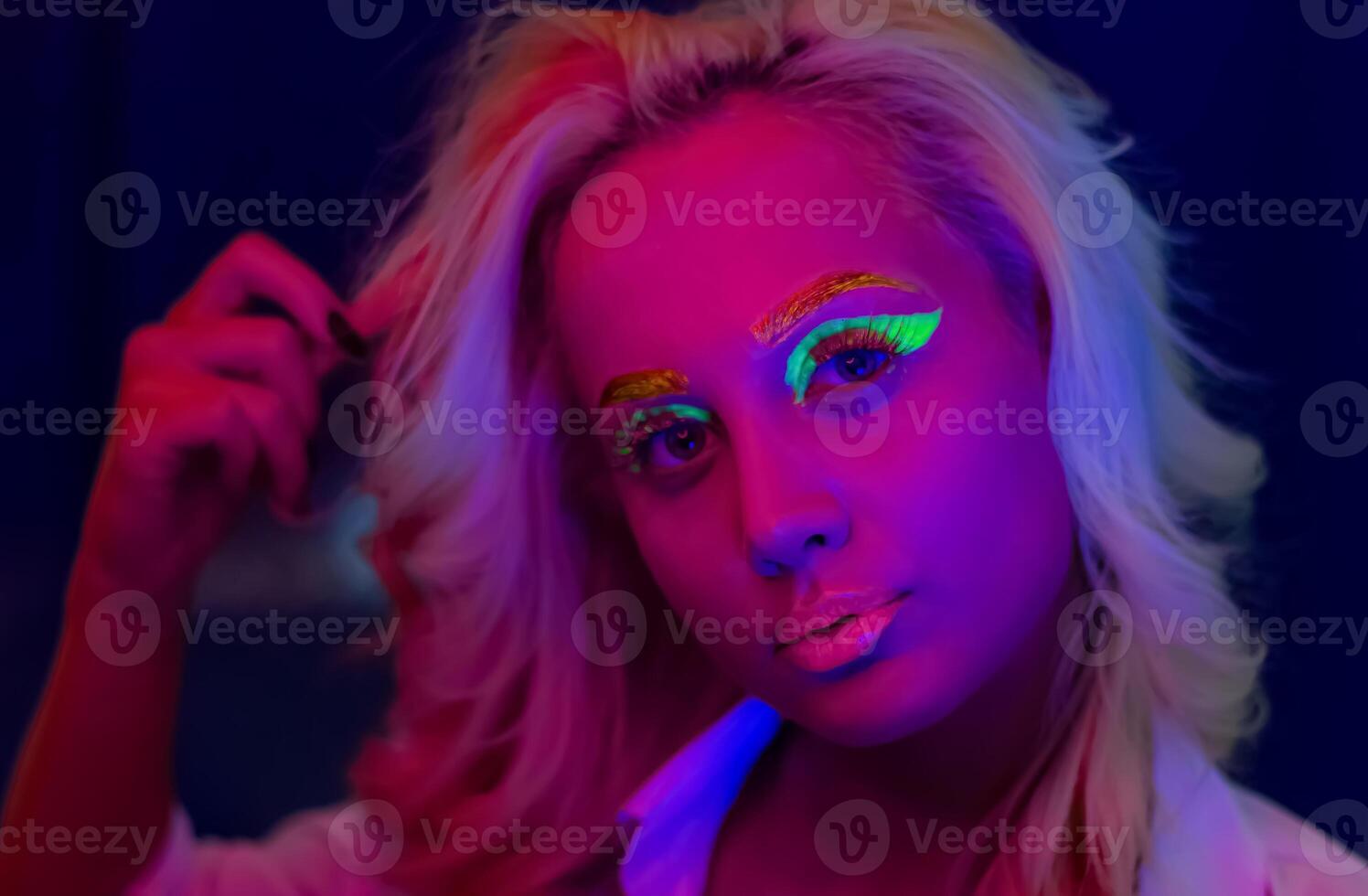 portrait of a woman with painted face, woman with uv makeup in studio, portrait of a woman in carnival mask, the woman is decorated in a ultraviolet powder photo