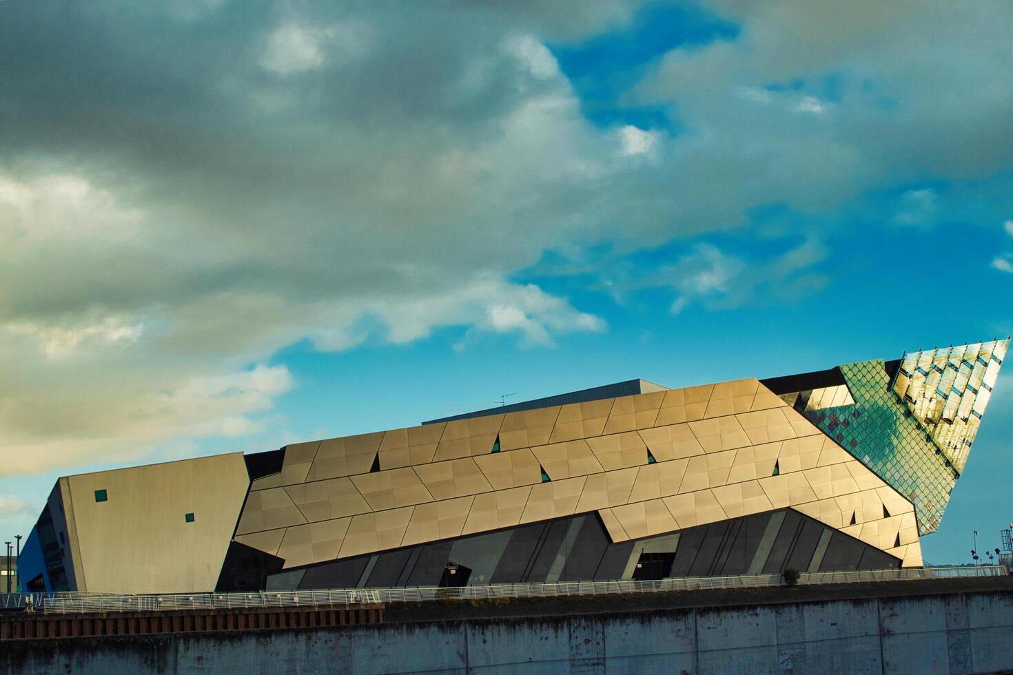 Modern architecture building under blue sky with clouds photo