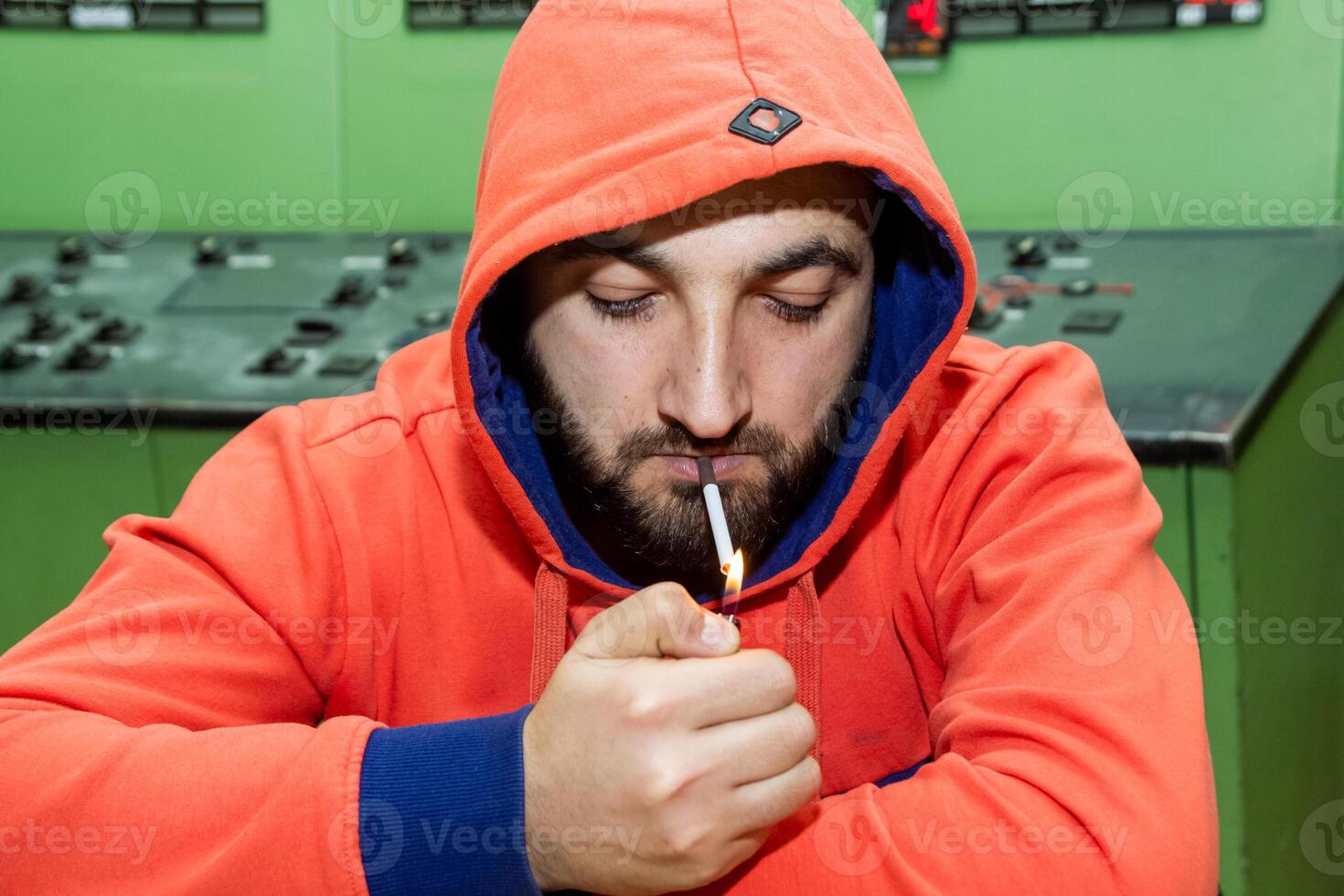 person smocking a cigarette photo