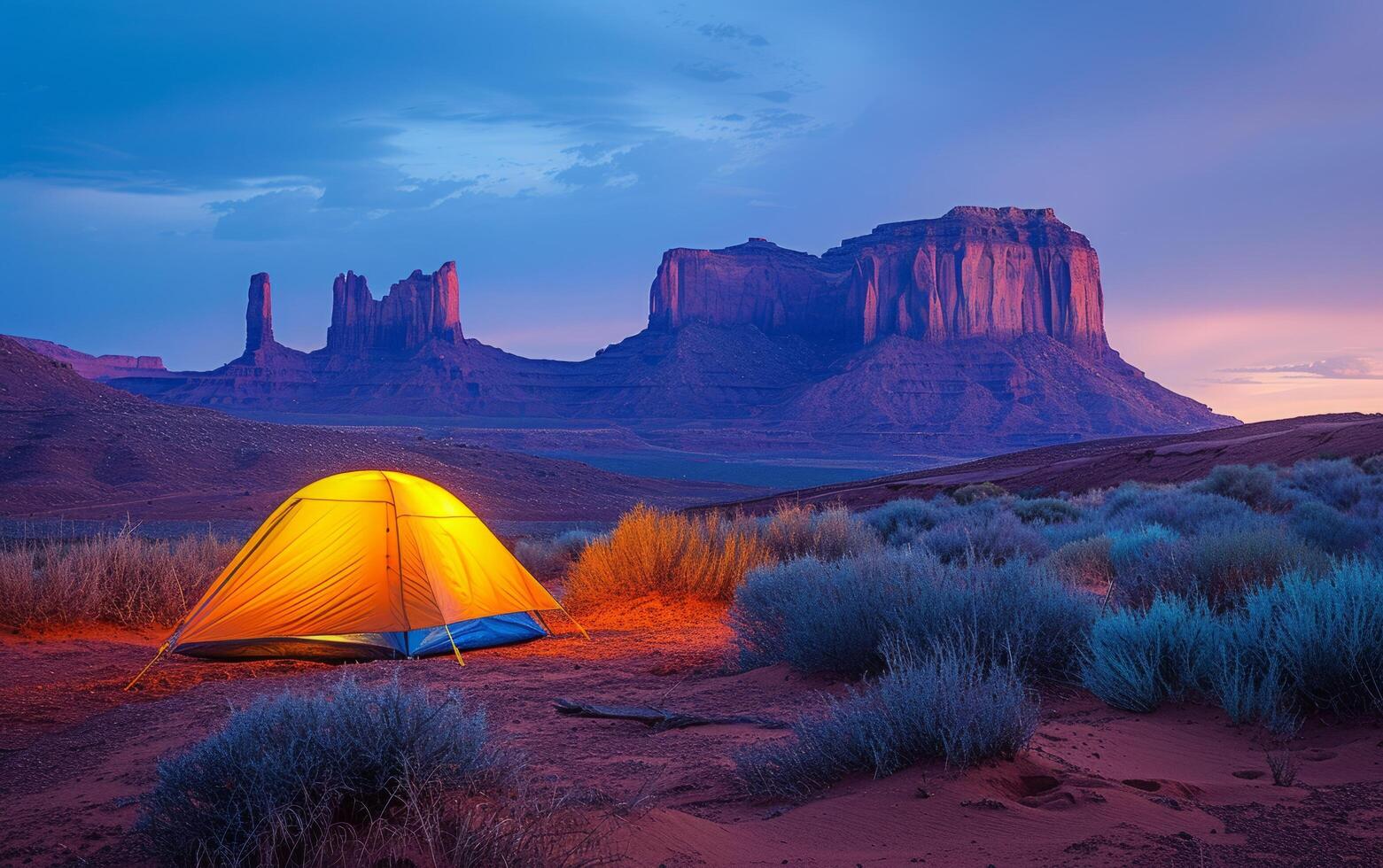 AI generated Tent Glows Under Desert Twilight Against Majestic Rock Formations photo