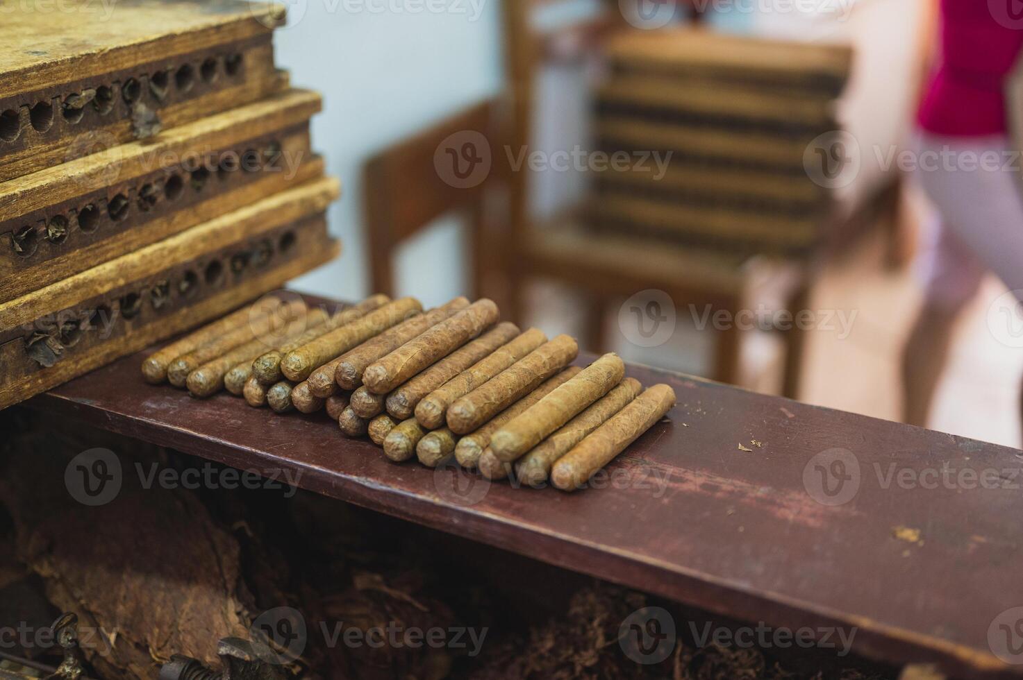 Close up of cigars in a tobacco factory. Selective focus. photo