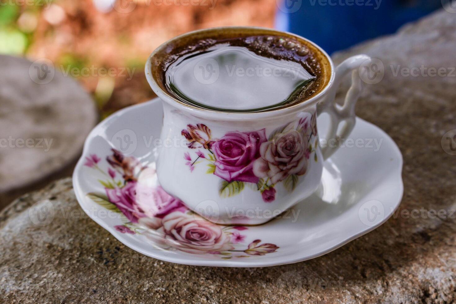 Coffee cup and saucer on the stone background, Thailand. photo