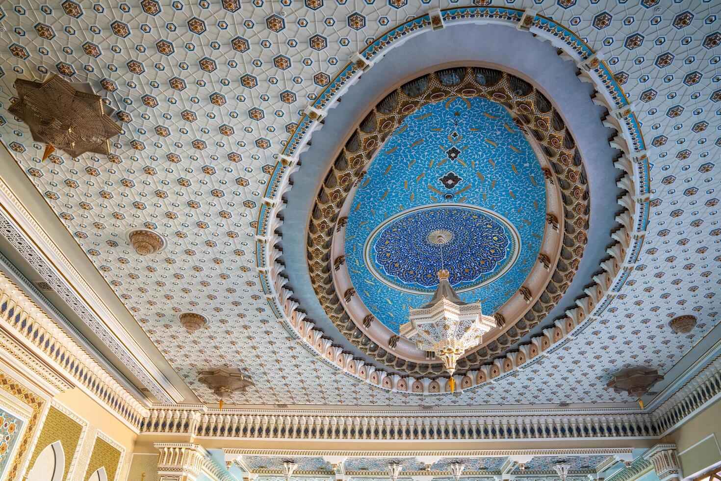 Tashkent, Uzbekistan-august 11, 2023-detail of the decorated ceiling of the Khazrati Imam Mosque in the Hazrati Imam complex during a sunny day. photo