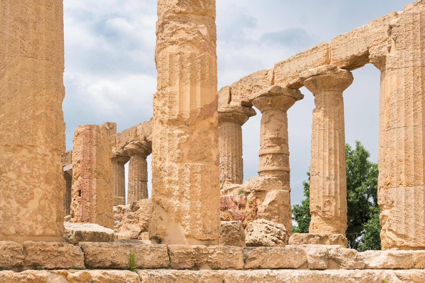 Agrigento, Italy-May 10, 2022-the imposing Greek Temple of Juno inside the Valle di Templi archaeological park near Agrigento during a sunny day photo