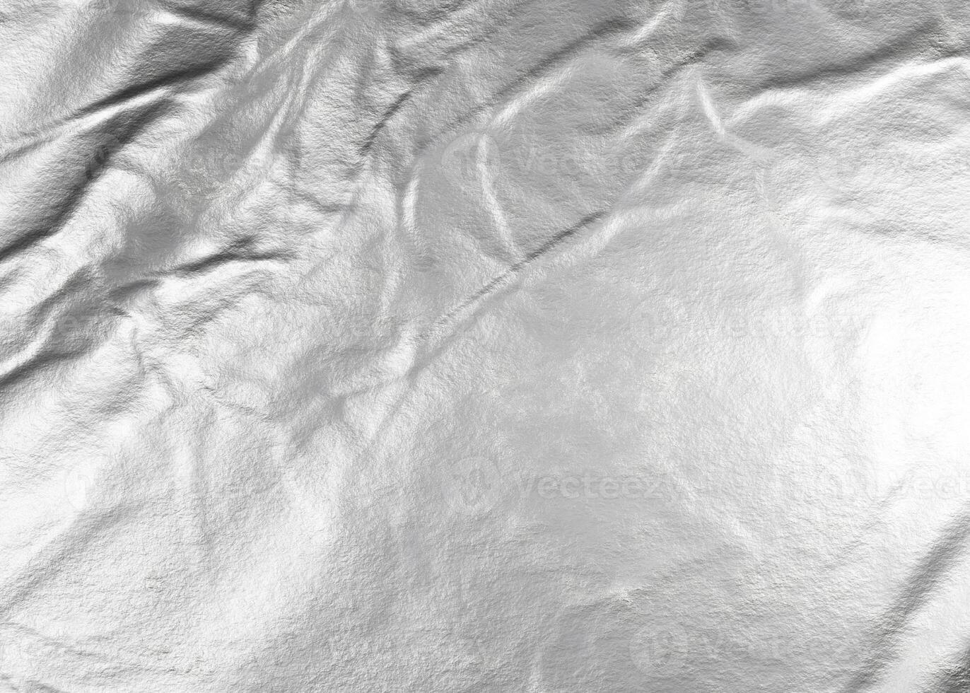 Crumpled white aluminum foil background photo