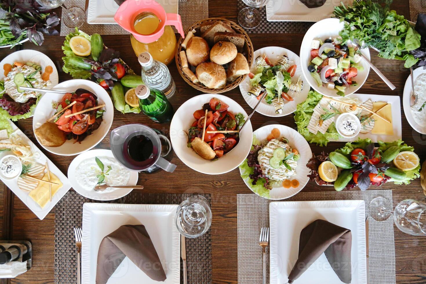 Abundant Display of Various Dishes on Table photo
