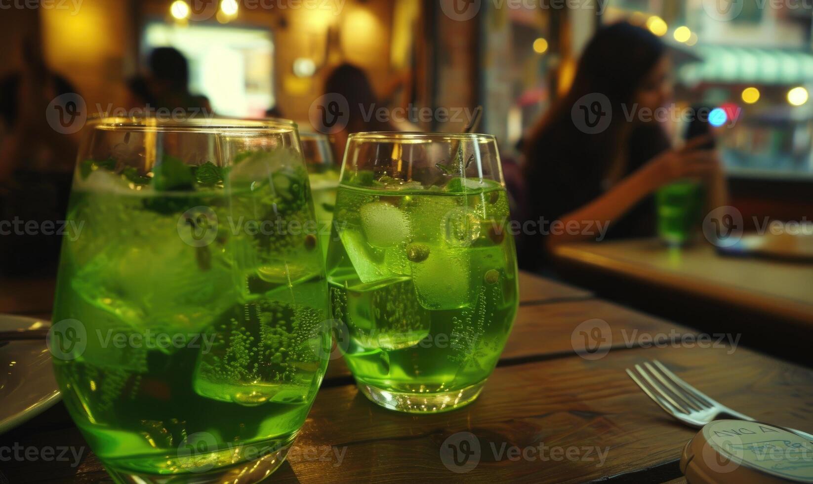 AI generated Refreshing green lemonade with ice in a glass on a wooden table photo
