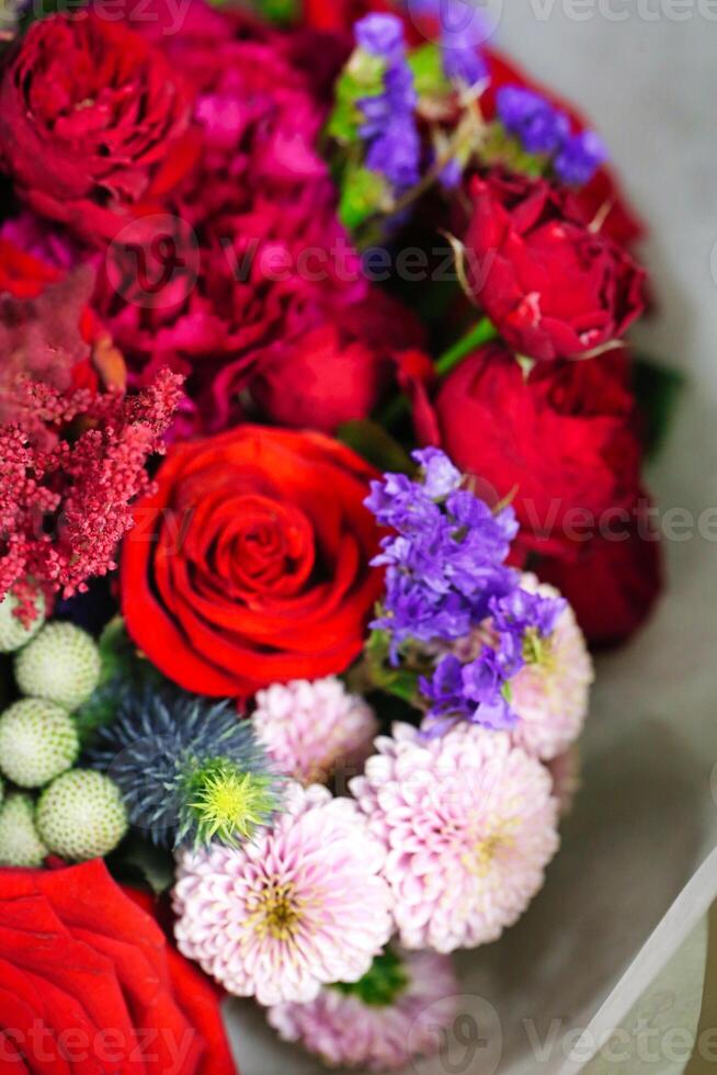 Colorful Bouquet of Red, Purple, and White Flowers photo