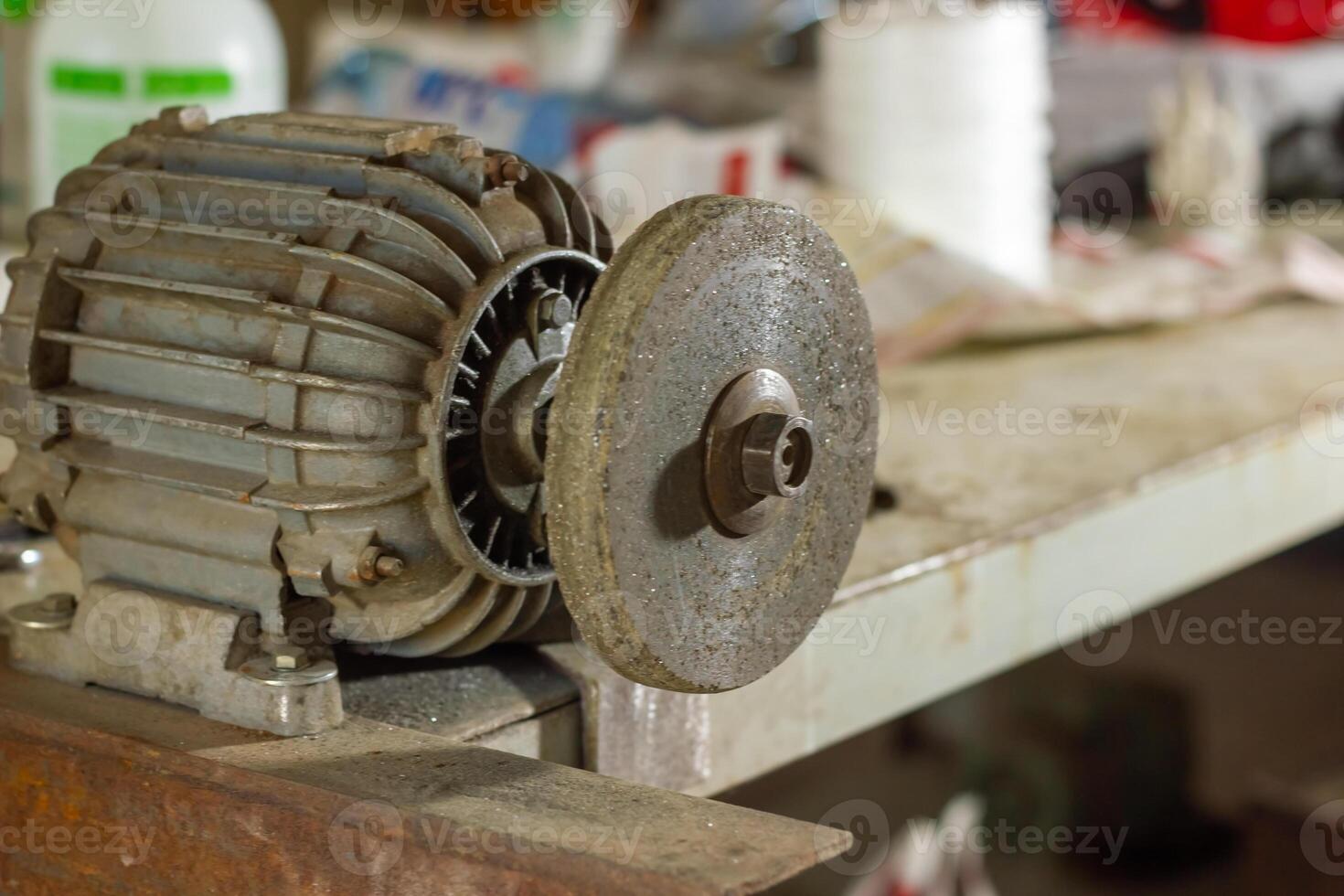 old rusty industrial machine in a factory, close up of an industrial machine photo