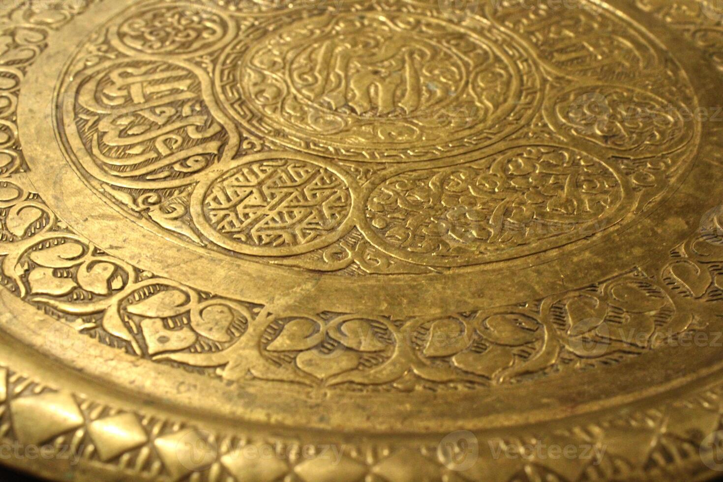 old oriental metal plate, golden plate photo