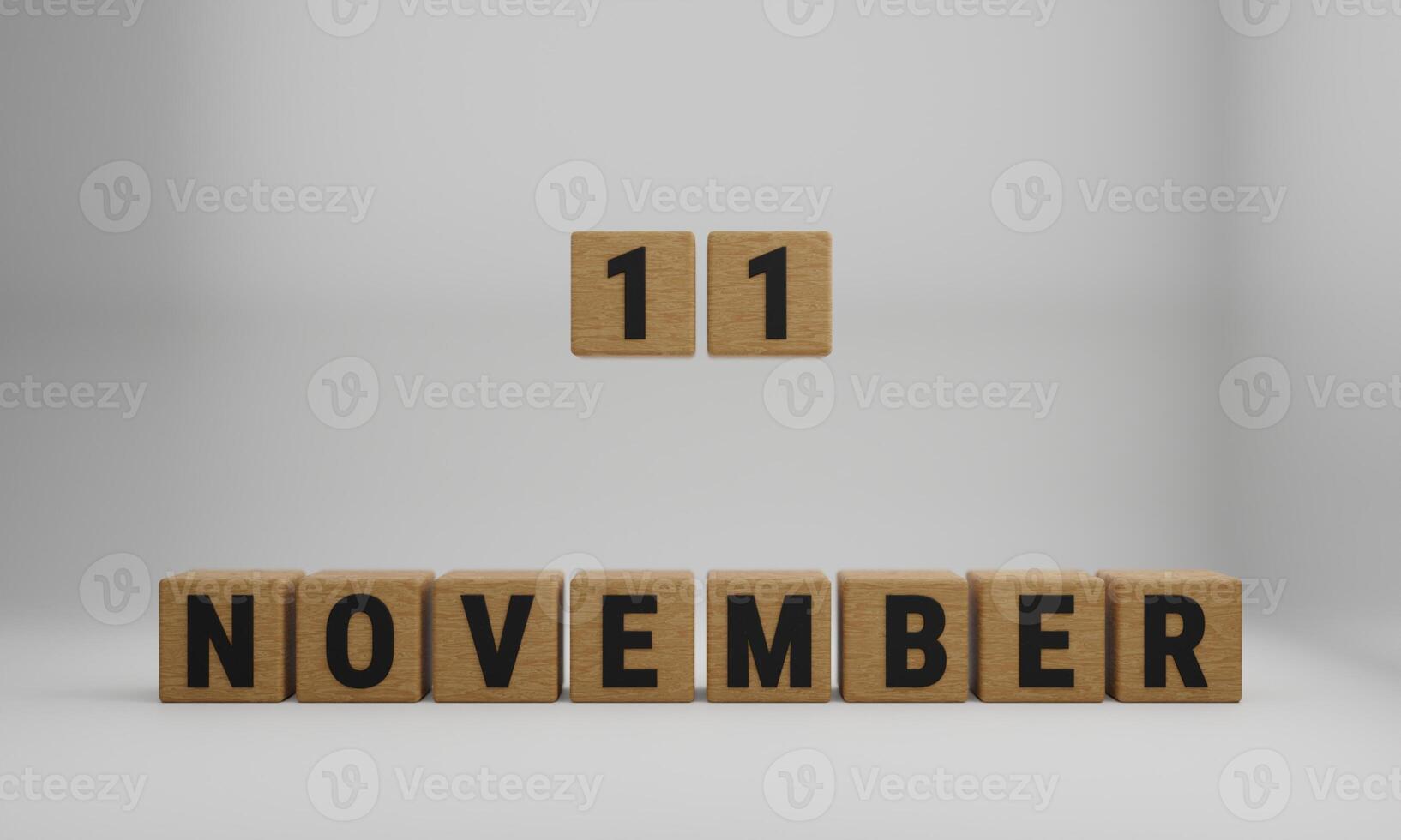 wooden cubes with arranged letters. November and 11 on blurry white background photo