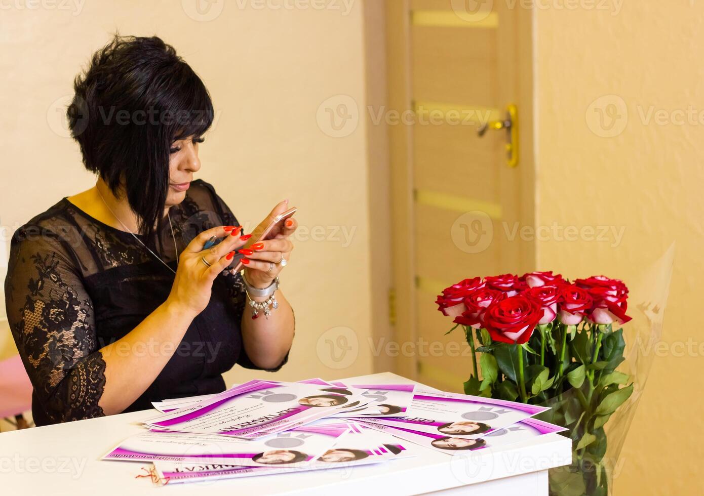 pretty young woman in officce photo