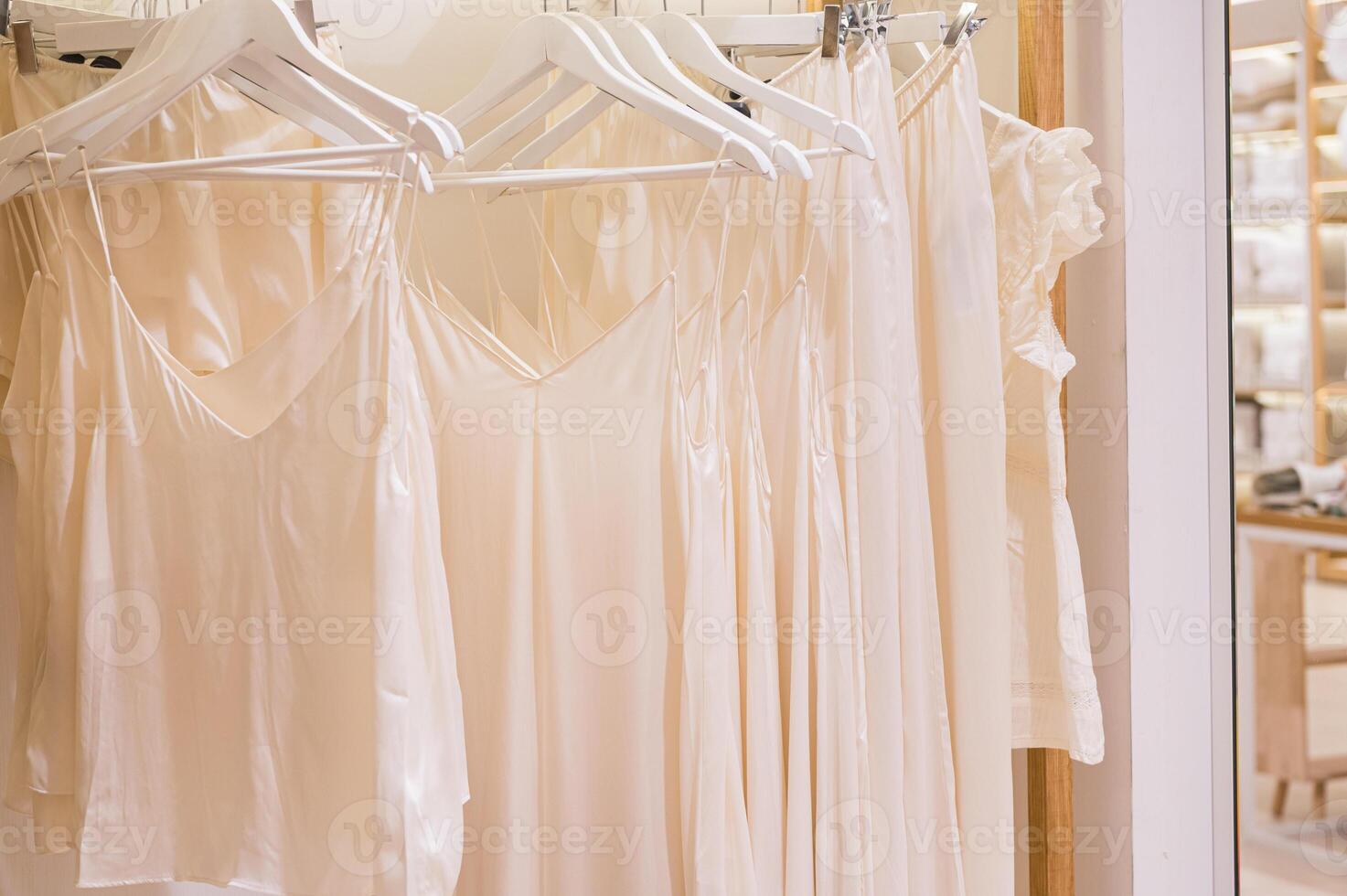 Chic Satin Dresses on Hangers photo