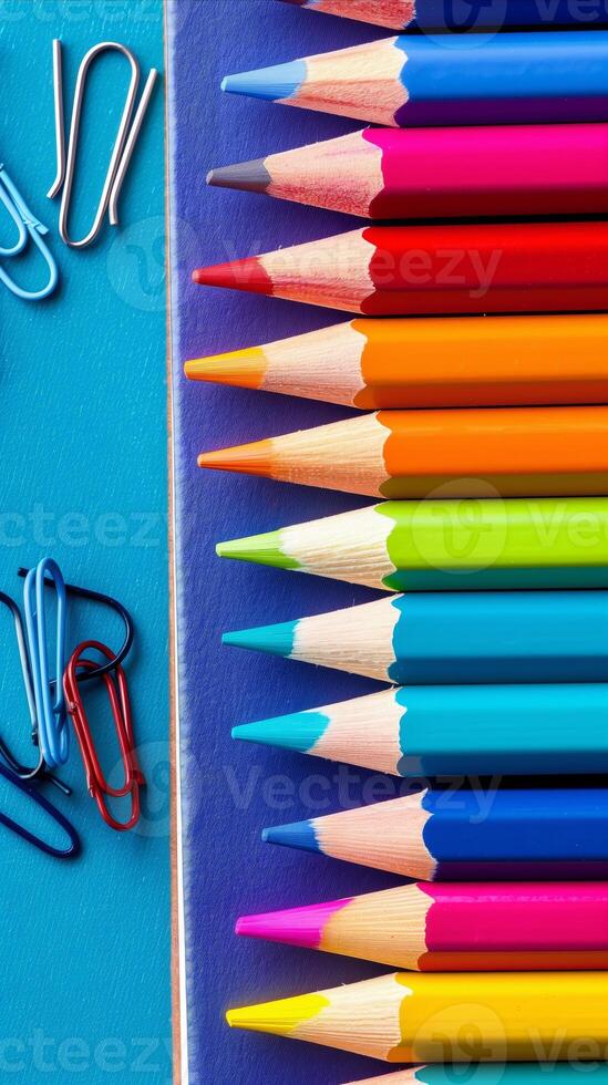 AI generated Colorful pencils and paper clips on dual background photo