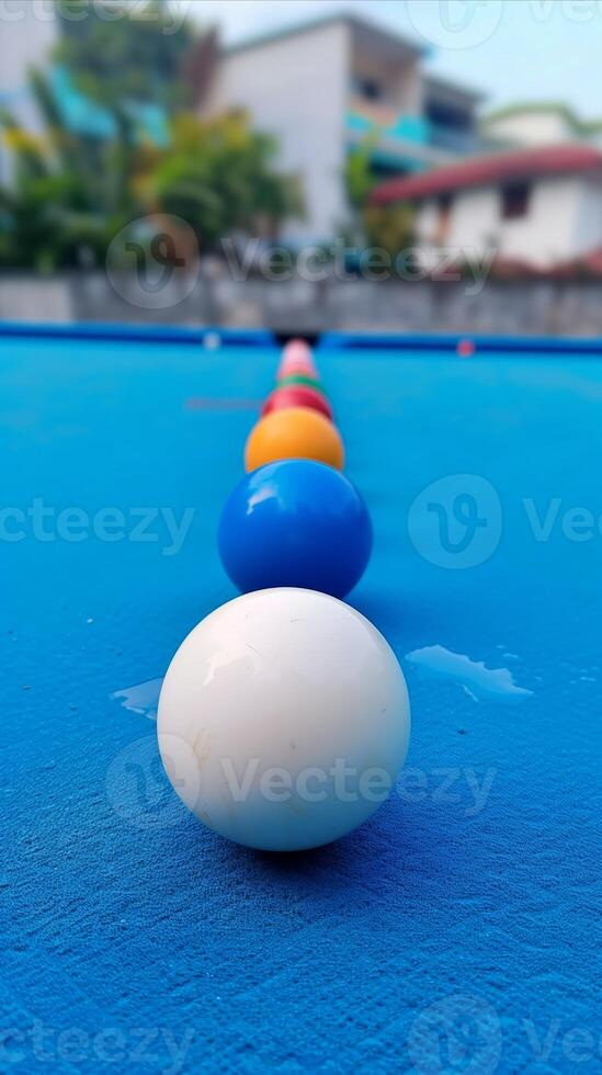 AI generated Colorful pool balls in a line on a blue table photo
