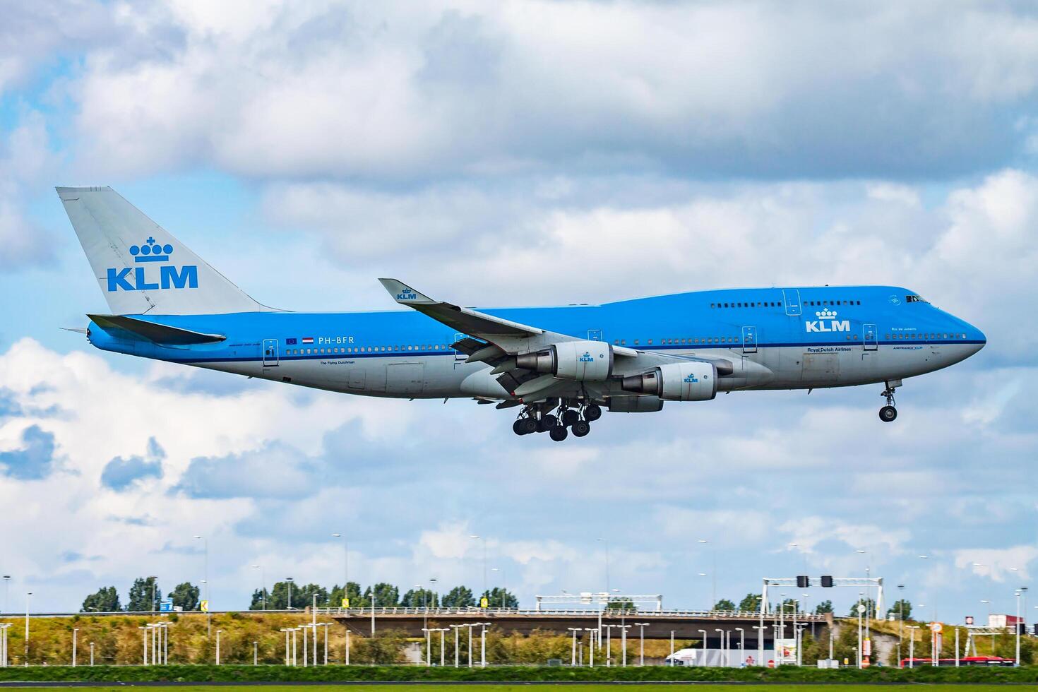 Amsterdam, Netherlands, 2014 - KLM Royal Dutch Airlines Boeing 747-400 PH-BFR passenger plane arrival and landing at Amsterdam Schipol Airport photo