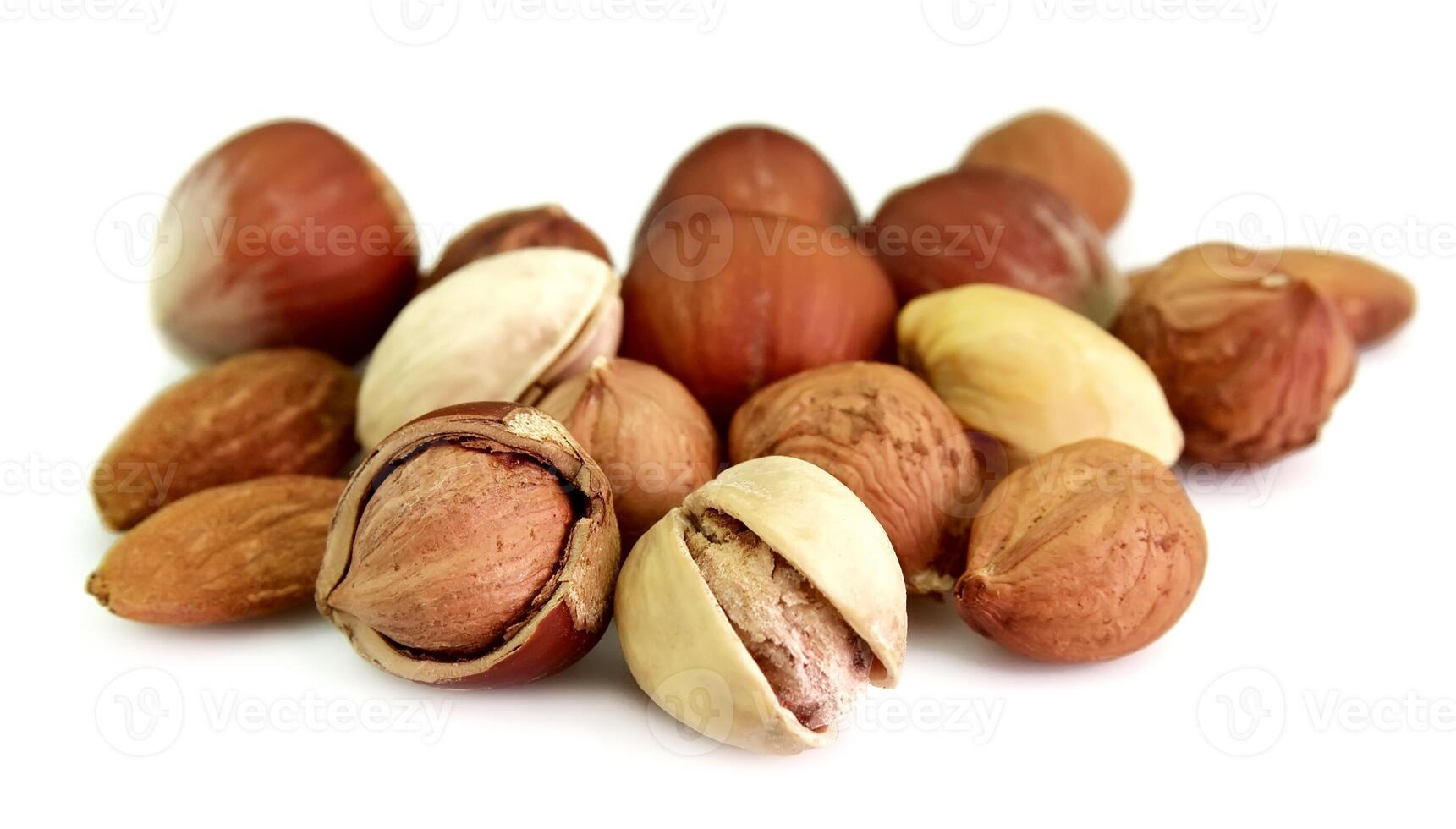 Dried nuts on white backgrounds photo