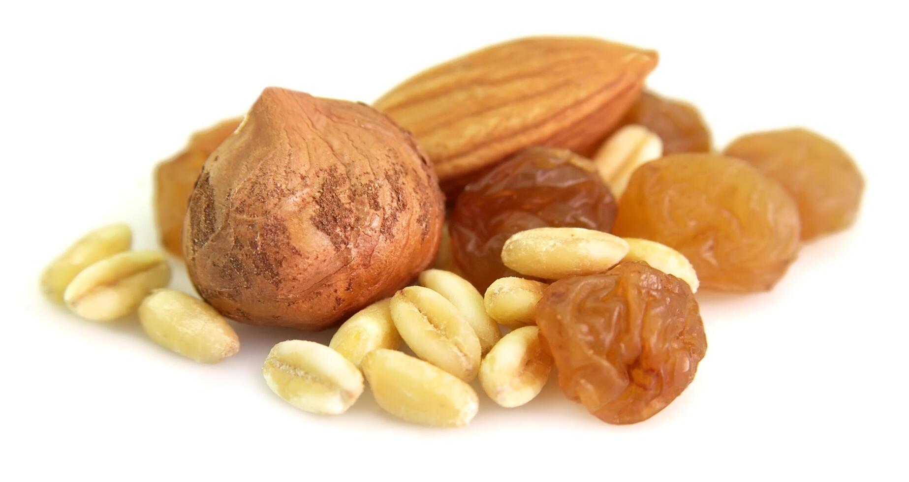 Nuts with raisin and wheat photo