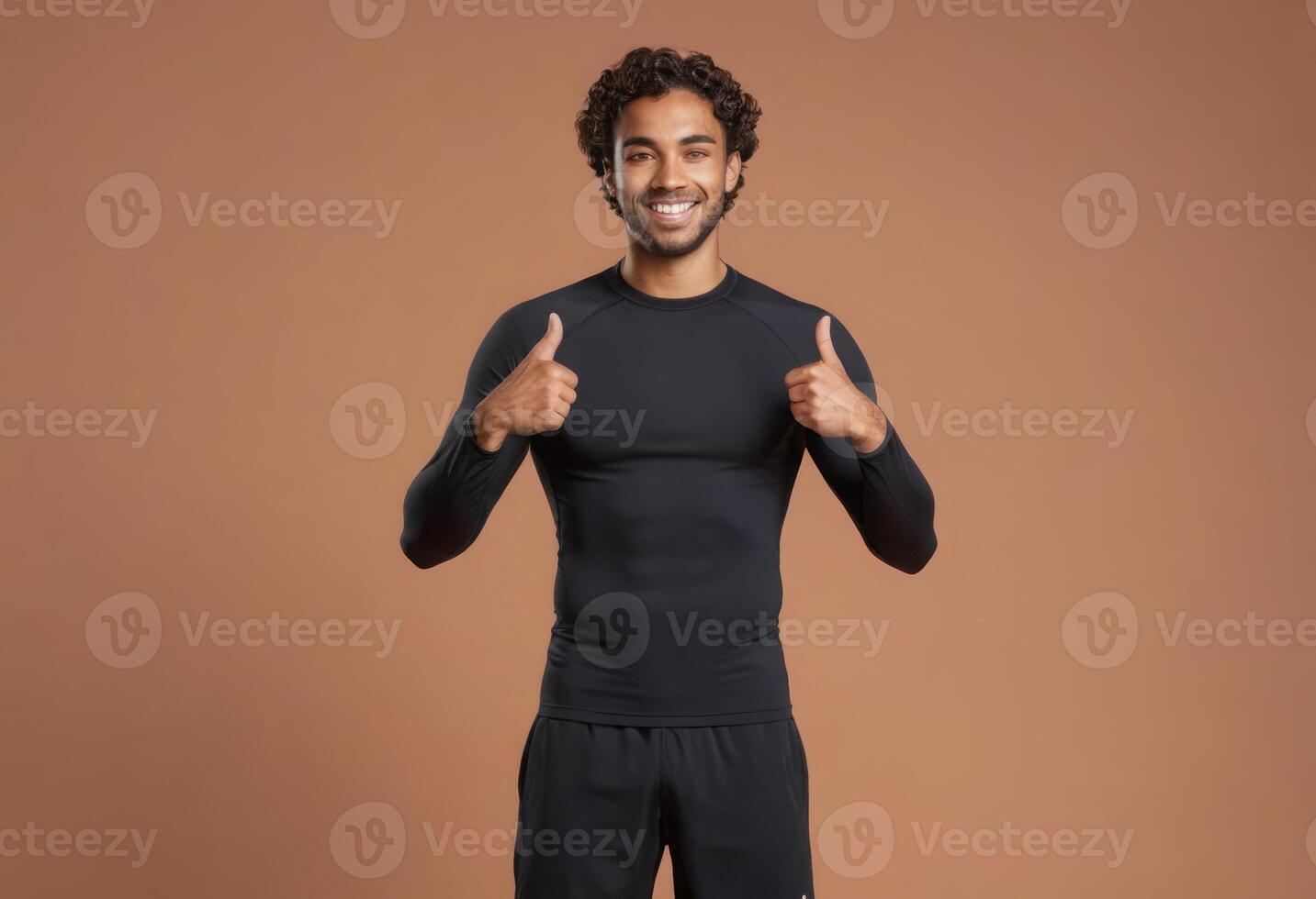 AI Generated A man in black thermal wear shows double thumbs up with a confident smile. photo