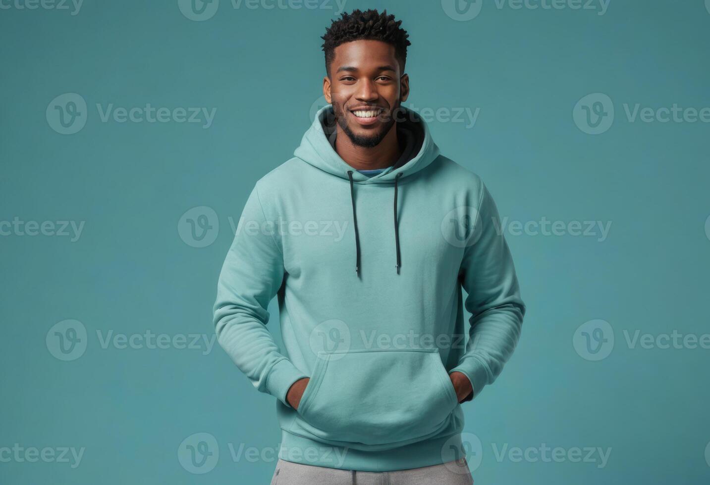 AI Generated A man in a teal hoodie with a beaming smile gives a thumbs up. His casual look suggests comfort and a laid-back style. photo