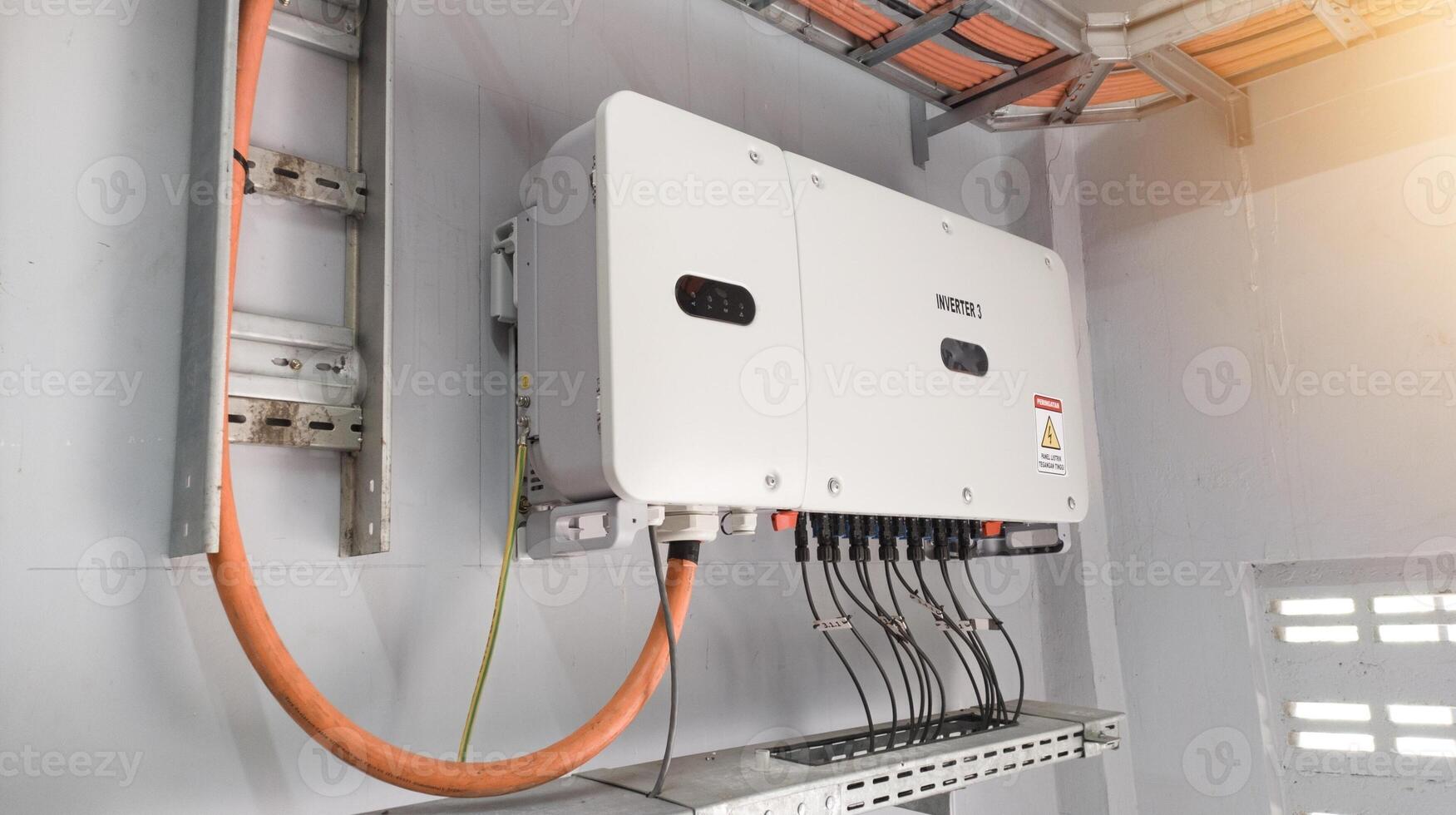 Close up the  inverter unit for solar panel on the wall. Technology of solar energy with shiny light. photo