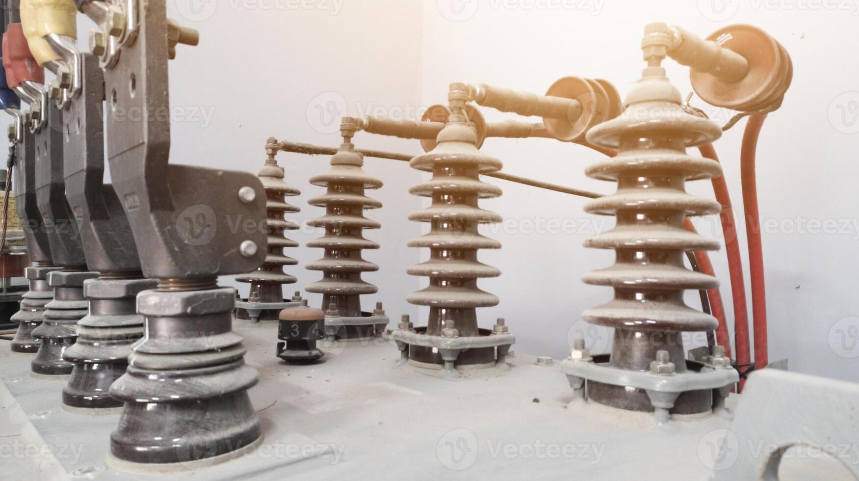 Terminals Conection Cable on High voltage transformer with electrical insulation and electrical equipment in power house on factory. photo