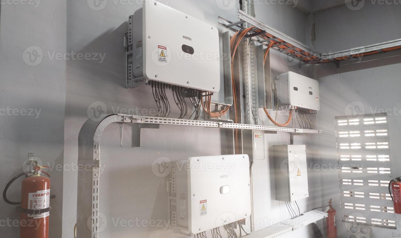 Instalation control of inverters solar panel on the wall. Technology of solar renewable energy.. photo