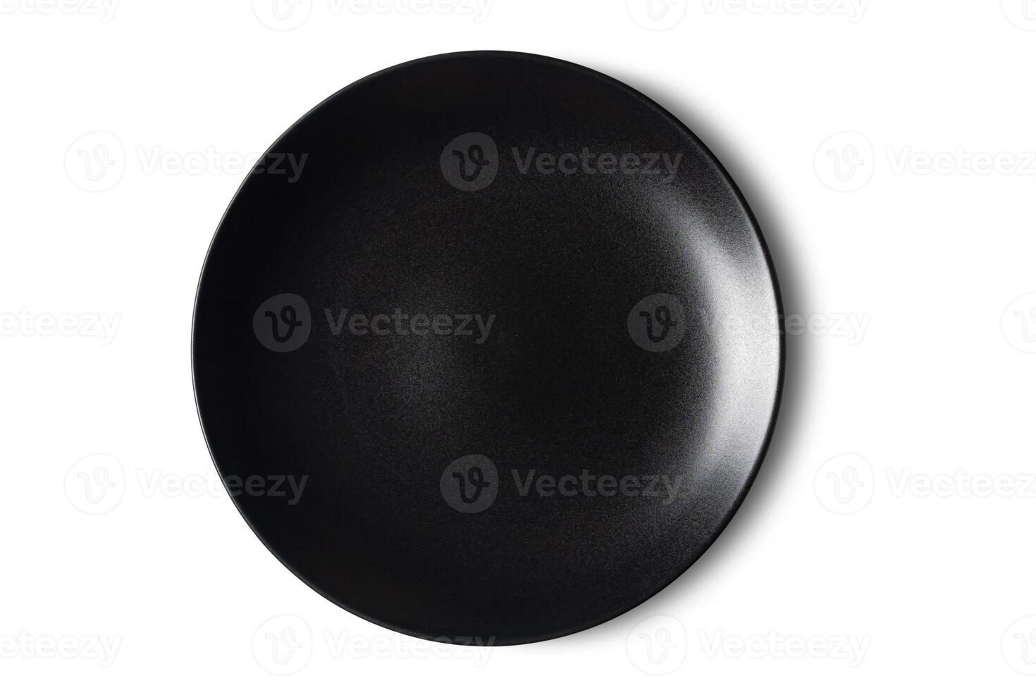 Top view of single new empty black ceramic plate isolated on white background with clipping path. photo