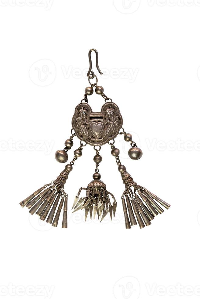 Top view of old ancient costume silver jewelry for hanging at the silver belt lay on the floor on white background with clipping path. photo