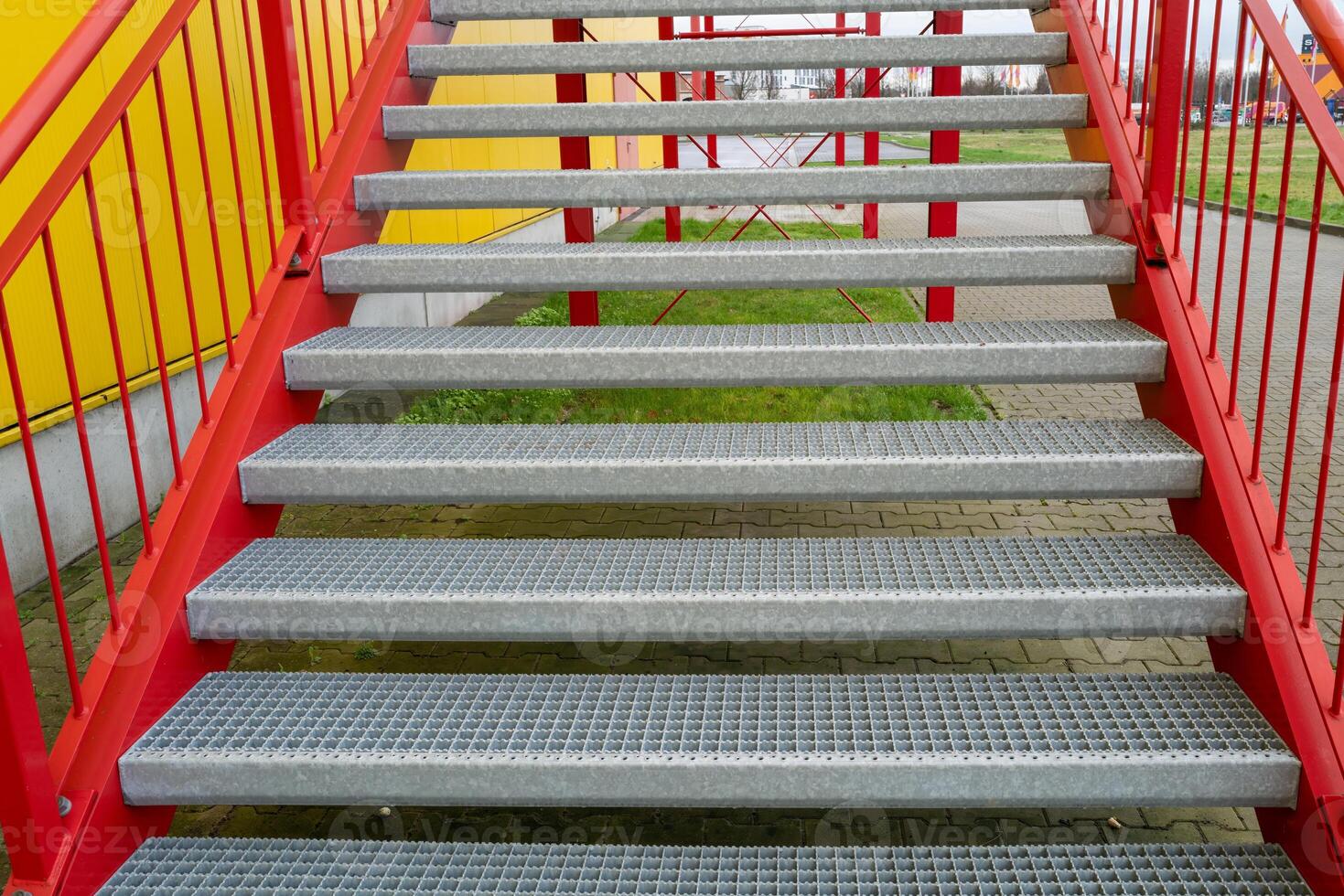 red metal stairway at factory photo