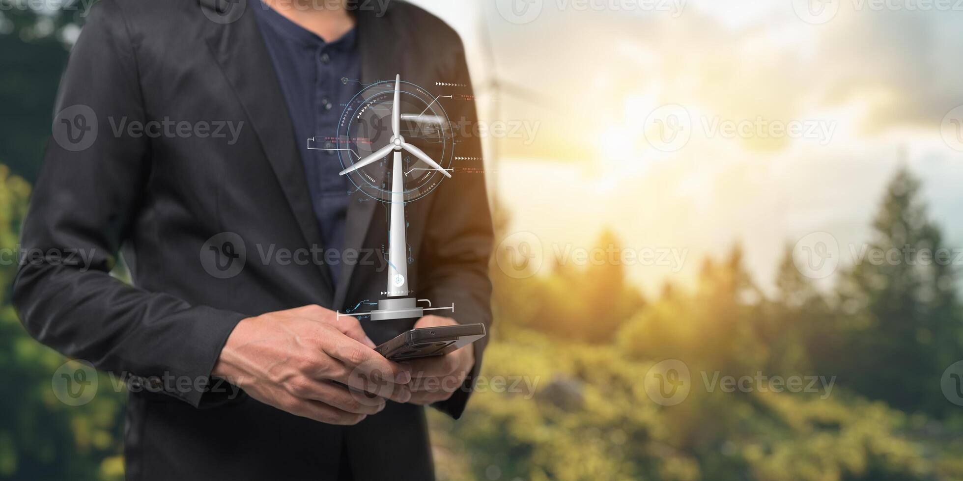 hologram screen Humans controlling the system Wind turbines produce electricity. Eco queue, clean energy from nature. photo