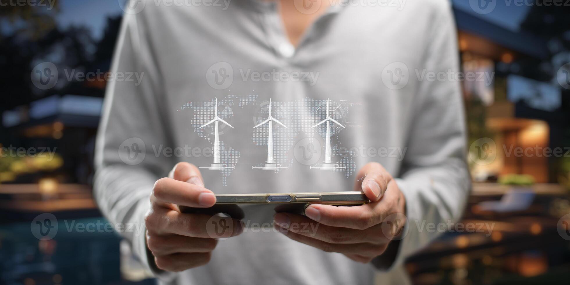 hologram screen Humans controlling the system Wind turbines produce electricity. Eco queue, clean energy from nature. photo