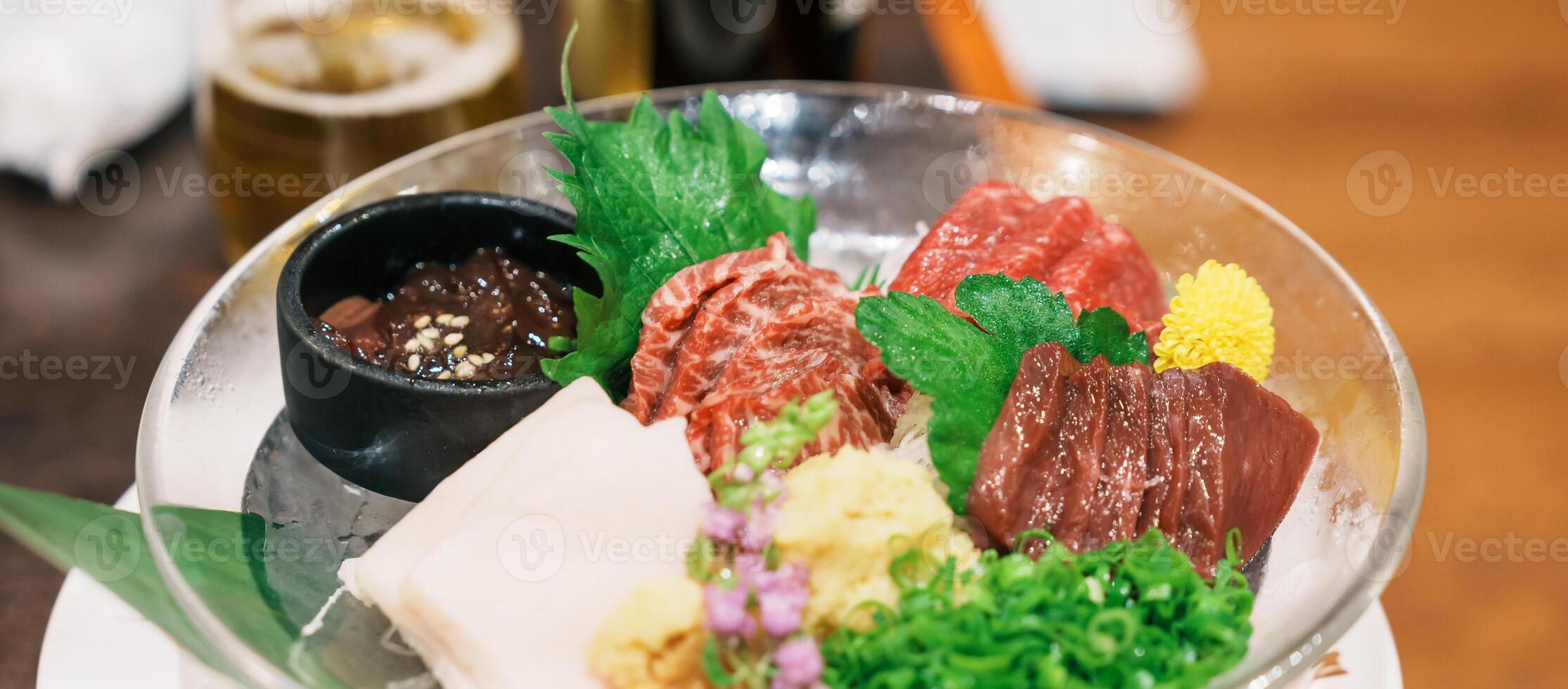 horse meat pieces sashimi or Japanese Basashi. Baniku includes lean meat, superb marbling, mane and liver. Premium meat and famous food in Matsumoto city, Nagano Prefecture, Japan photo