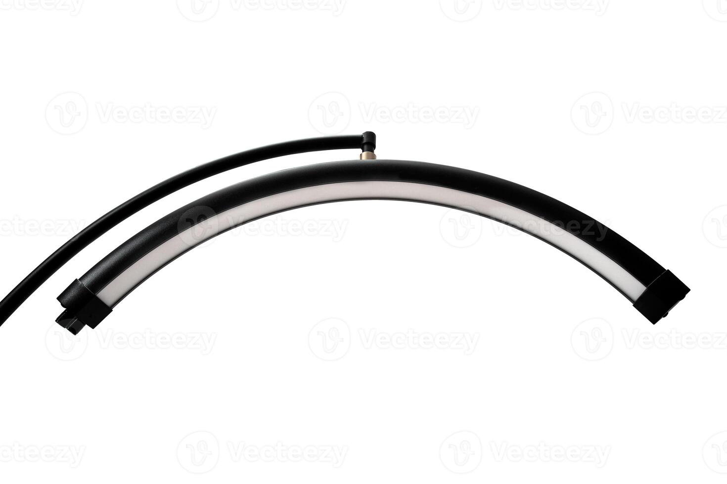 Modern LED floor lamp in the shape of a crescent. Lamp for minimalist interiors. Isolate on a white back photo